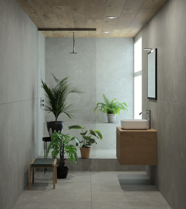 Moderne biofilic design badkamer met planten, houtaccenten en betonlook tegels, passend bij trends in badkamers.