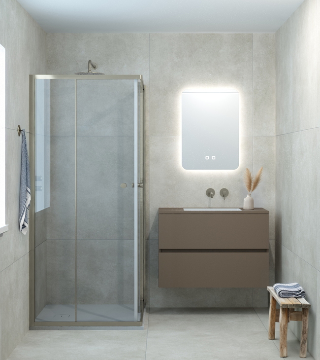 Douchecabine met hoekinstap in moderne badkamer met beige tegels, spiegel met verlichting en strak badkamermeubel.